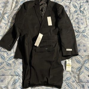 NWT boy’s Calvin Klein two piece suit 14 husky